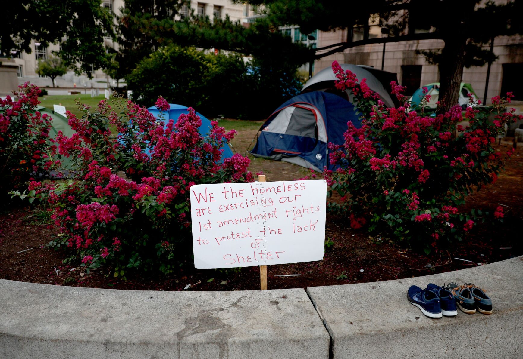 Homeless encampment remains outside ӣƵ City Hall on Tuesday morning